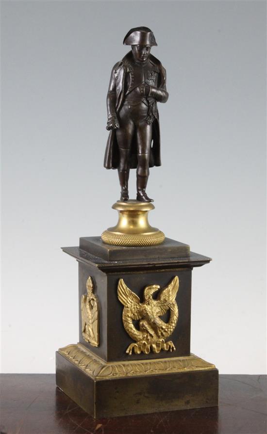 A late 19th / early 20th century French bronze and ormolu figure of Napoleon, 12.5in.